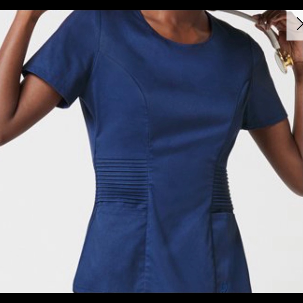 JAANUU Scrubs pin tuck top with side gold zipper